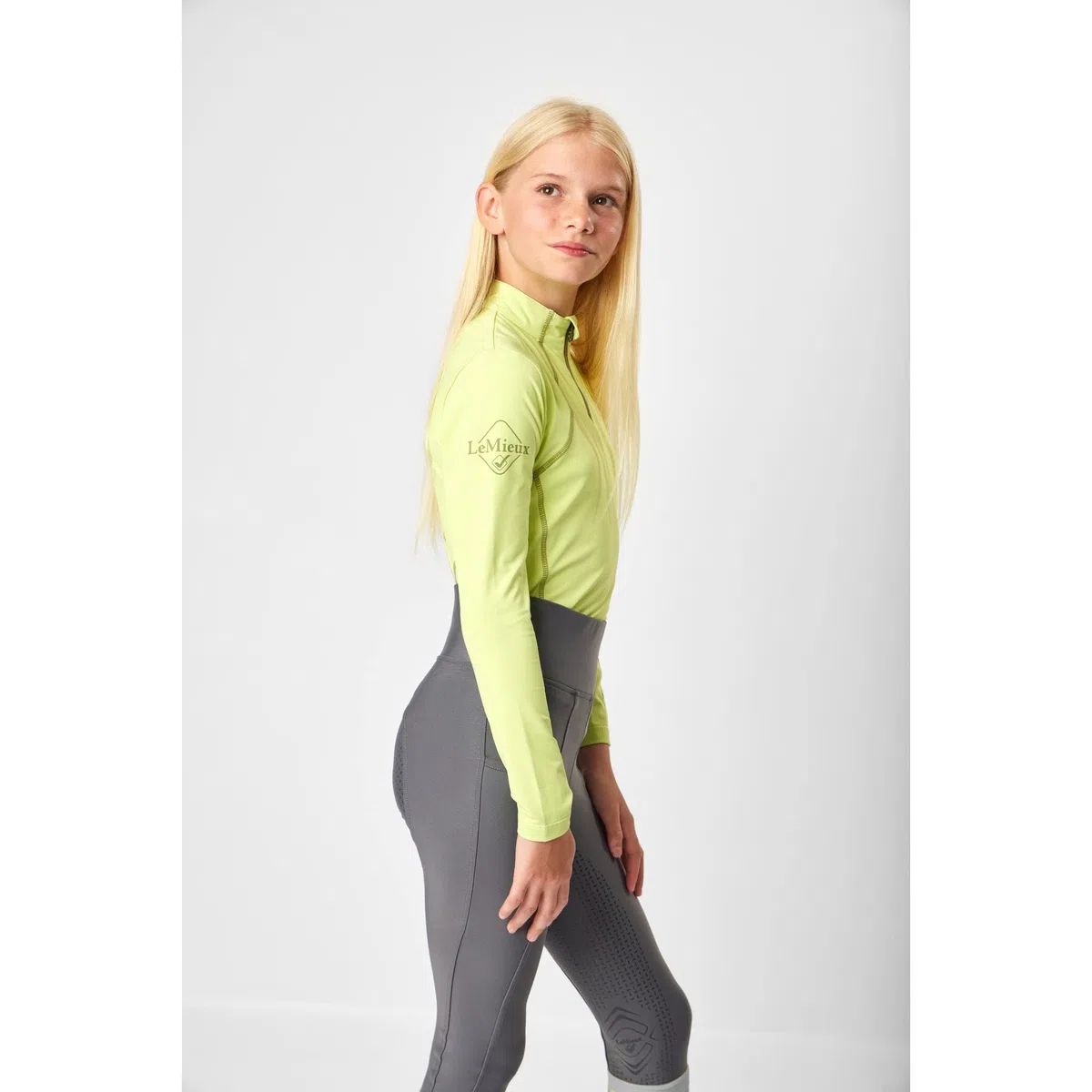 LeMieux Maglietta a maniche lunghe elasticizzata antimicrobica a maniche lunghe con strato base per bambini con tessuto traspirante