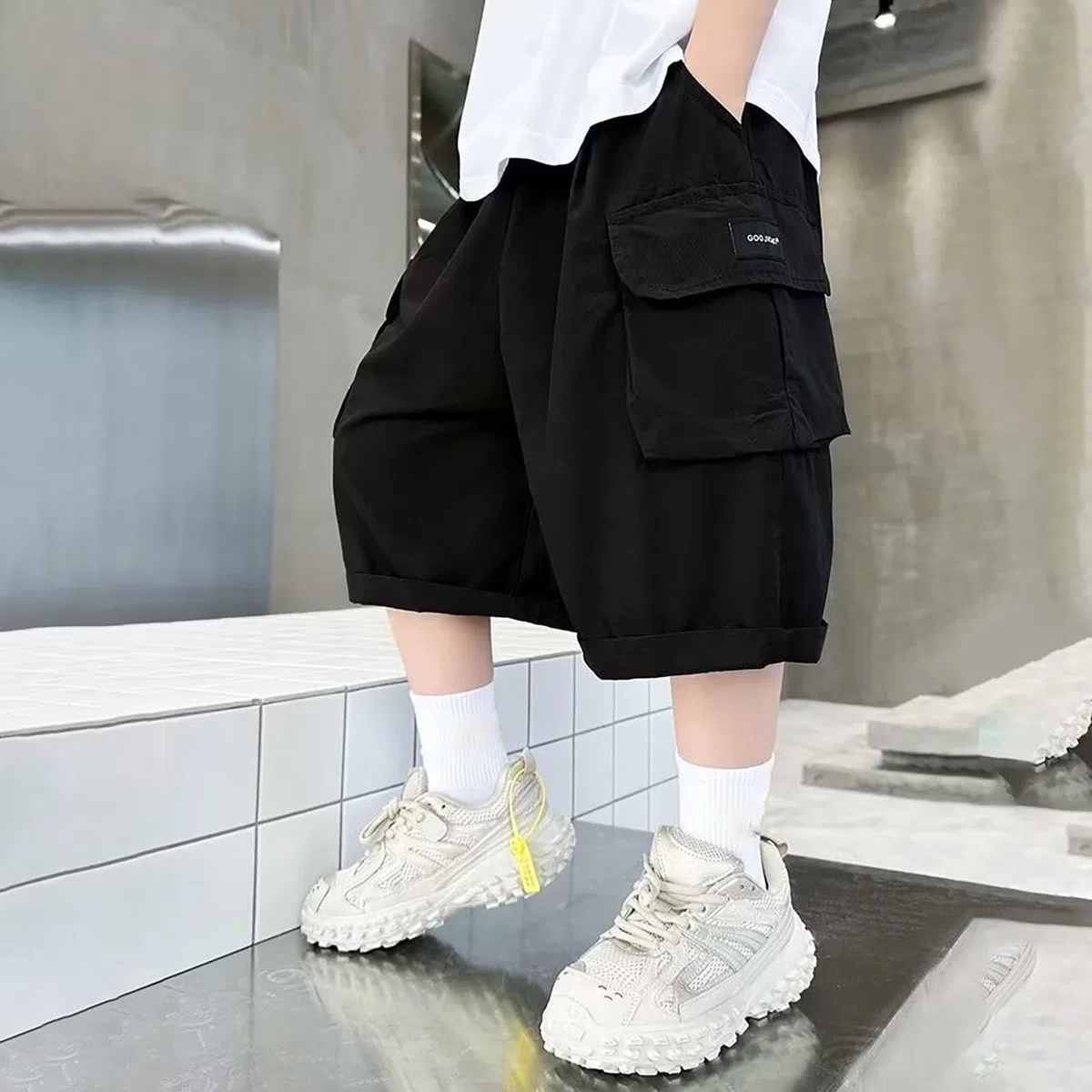 Pantaloncini cargo per ragazzi Pantaloni corti estivi larghi per bambini Pantaloni corti leggeri casual larghi elastici in vita pantaloncini tasche Streetwear alla moda
